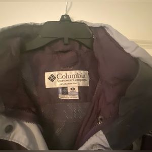 Columbia women’s small windbreaker with hood. Plum and grey.